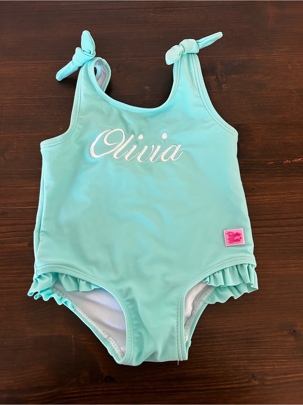 Ruffle Butts Aqua One-Piece Swimsuit with White Script